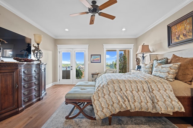 bedroom with access to exterior, french doors, ornamental molding, and light wood finished floors