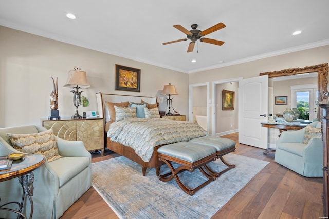 bedroom featuring ceiling fan, ornamental molding, wood finished floors, and recessed lighting