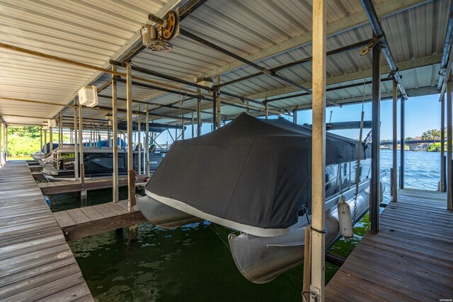 view of dock with a water view and boat lift