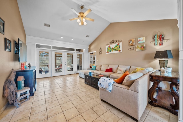 living room featuring french doors, visible vents, light tile patterned flooring, ceiling fan, and vaulted ceiling