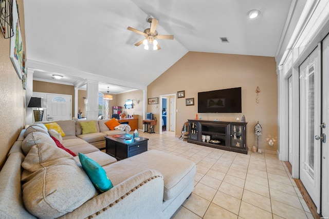 living area featuring light tile patterned floors, decorative columns, visible vents, lofted ceiling, and ceiling fan