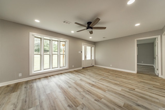 interior space with recessed lighting, ceiling fan, and visible vents
