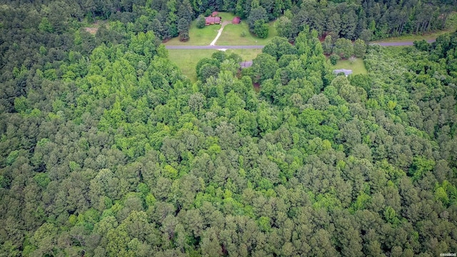 aerial view featuring a view of trees