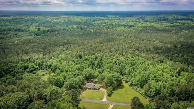 aerial view featuring a view of trees