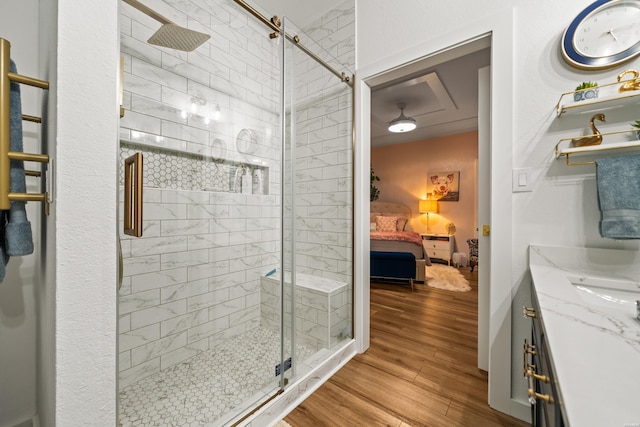 126 Chambers Pt Unit E, Hot Springs, AR 71913 - ensuite bathroom with a stall shower, vanity, wood finished floors, and ensuite bathroom