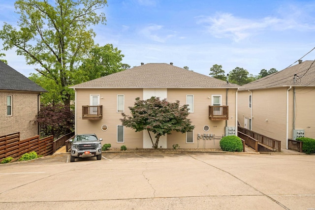 126 Chambers Pt Unit E, Hot Springs, AR 71913 - back of property with uncovered parking, a balcony, and fence