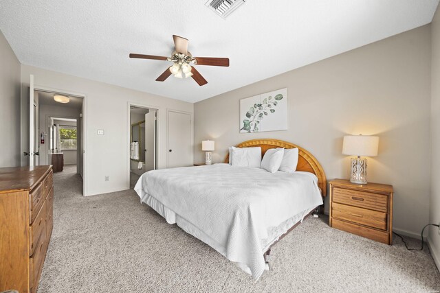 5371 Central Ave Unit 6H, Hot Springs, AR 71913 - bedroom featuring light carpet, a ceiling fan, and connected bathroom