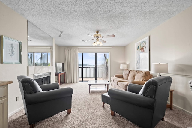 5371 Central Ave Unit 6H, Hot Springs, AR 71913 - living area with carpet flooring, ceiling fan, and a textured ceiling