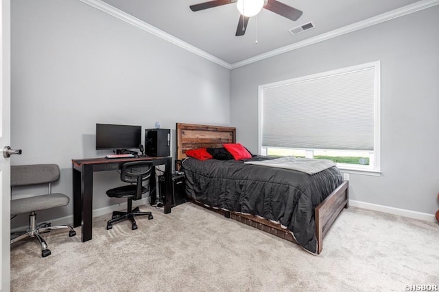 bedroom with carpet flooring, a ceiling fan, baseboards, visible vents, and crown molding