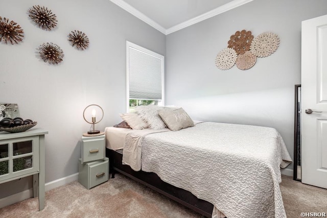 bedroom featuring light carpet, ornamental molding, and baseboards