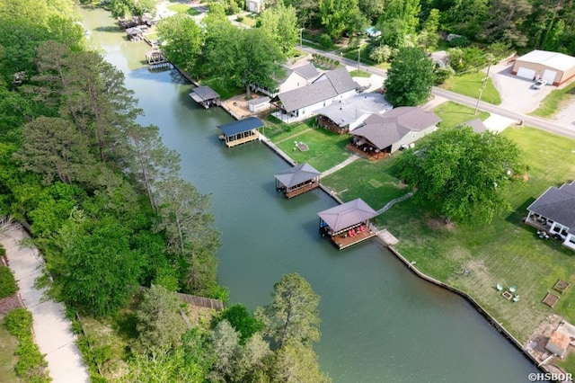 birds eye view of property with a residential view and a water view