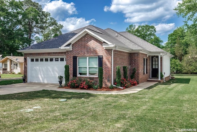 single story home with a garage, a front lawn, concrete driveway, and brick siding