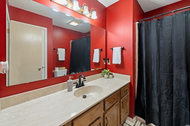 711 S Red St, Sheridan, AR 72150 - full bathroom featuring a shower with shower curtain, a textured ceiling, toilet, and vanity