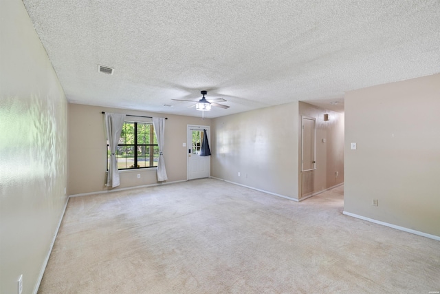 711 S Red St, Sheridan, AR 72150 - unfurnished room featuring a textured ceiling, baseboards, ceiling fan, and visible vents