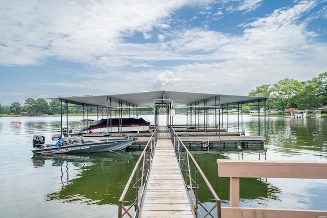 dock area featuring a water view and boat lift