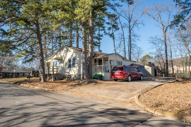 view of front of house featuring a residential view and a porch