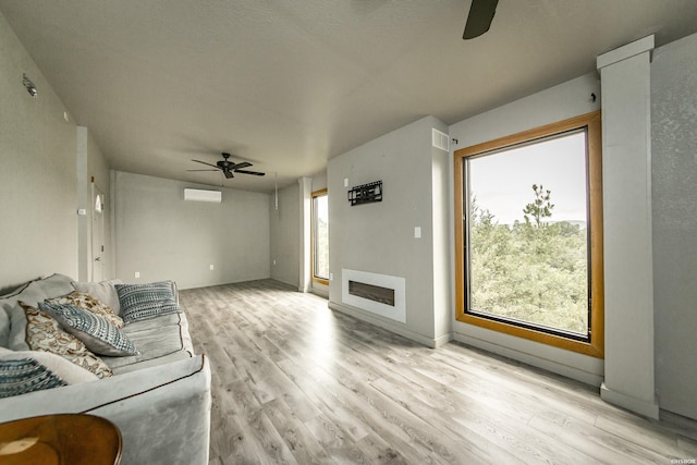 415 Gold Nugget Loop, Hot Springs, AR 71913 - living area featuring a ceiling fan and light wood-style flooring