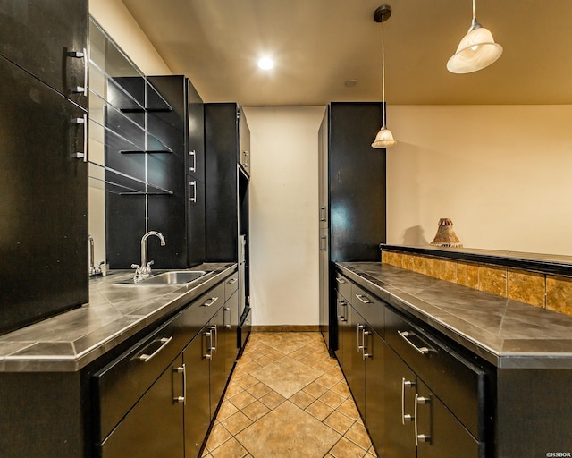 415 Gold Nugget Loop, Hot Springs, AR 71913 - kitchen featuring stainless steel countertops, light tile patterned floors, hanging light fixtures, and dark cabinets