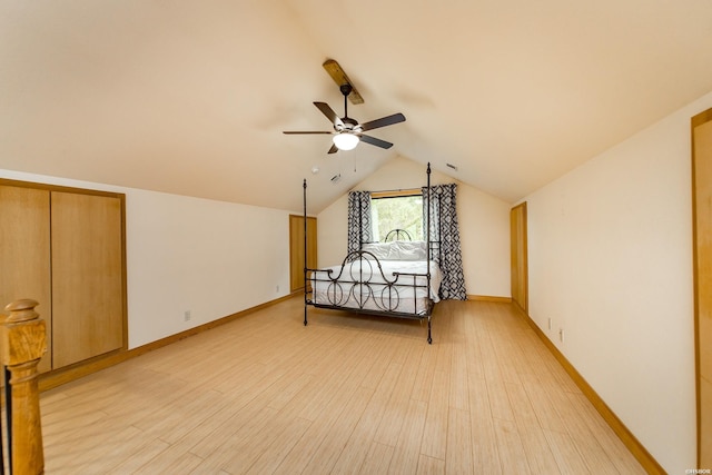 415 Gold Nugget Loop, Hot Springs, AR 71913 - bedroom with light wood-style flooring, lofted ceiling, and a ceiling fan