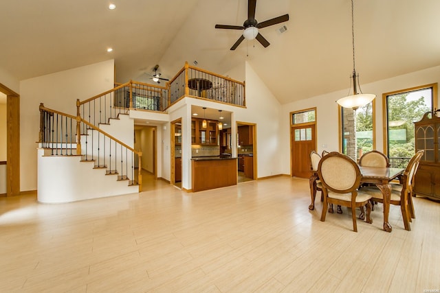 415 Gold Nugget Loop, Hot Springs, AR 71913 - dining space with ceiling fan, high vaulted ceiling, stairs, and recessed lighting