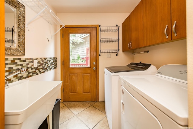 415 Gold Nugget Loop, Hot Springs, AR 71913 - laundry area featuring independent washer and dryer, cabinet space, and light tile patterned floors