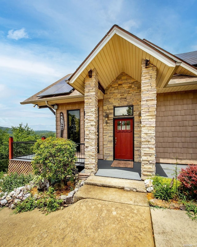 415 Gold Nugget Loop, Hot Springs, AR 71913 - doorway to property featuring stone siding and roof with shingles