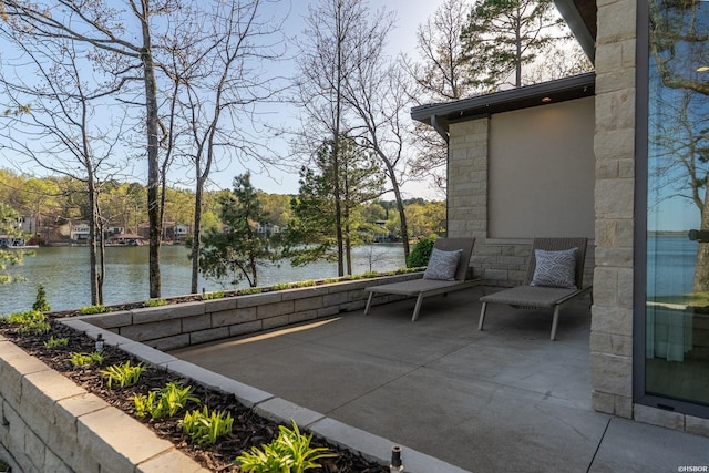 7 Tiburon Ln, Hot Springs Village, AR 71909 - view of patio with a water view