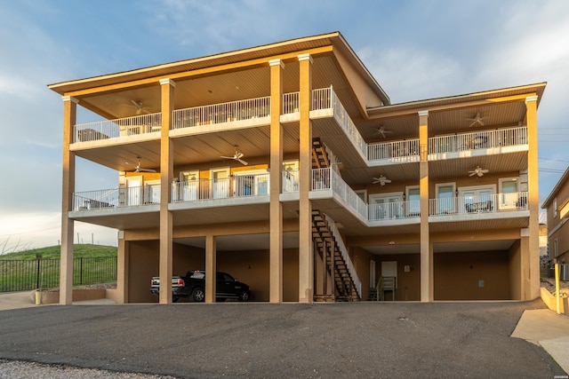 141 Central Ter Unit B, Hot Springs, AR 71913 - exterior space with a balcony, ceiling fan, stairs, and fence