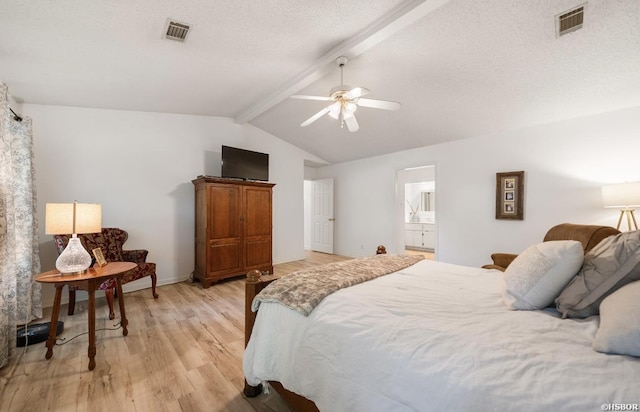 200 Cole Pl, Hot Springs, AR 71901 - bedroom with light wood-style flooring, a ceiling fan, ensuite bath, and a textured ceiling