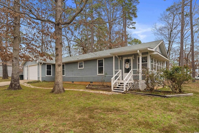 single story home with crawl space, a garage, and a front yard