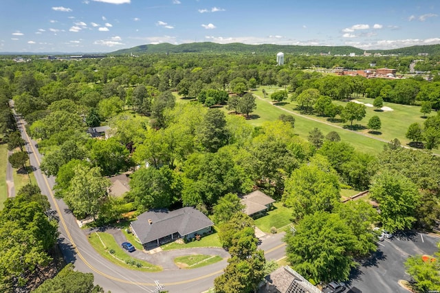aerial view featuring a wooded view