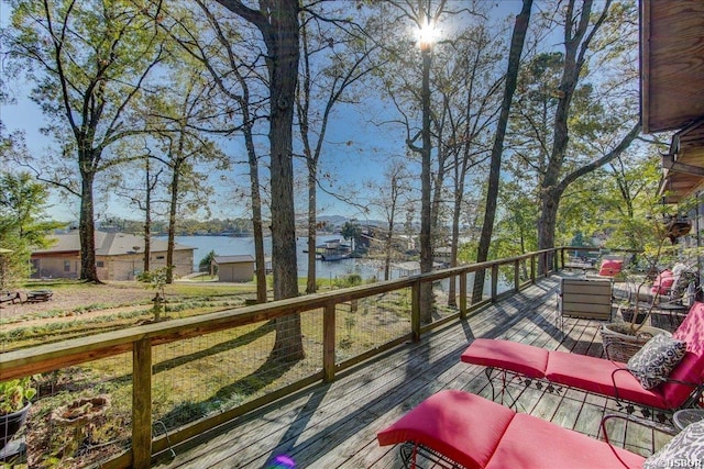 deck featuring a water view