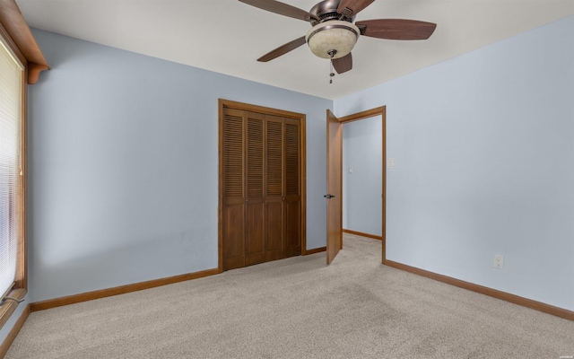 5 Arga Pl, Hot Springs, AR 71909 - unfurnished bedroom featuring light colored carpet, a closet, multiple windows, and ceiling fan