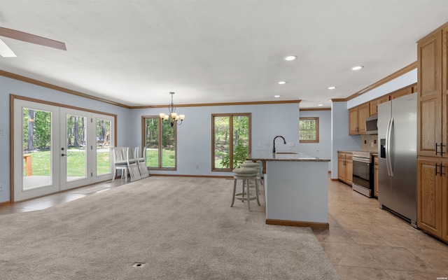 5 Arga Pl, Hot Springs, AR 71909 - kitchen with appliances with stainless steel finishes, ornamental molding, a chandelier, a breakfast bar, and recessed lighting