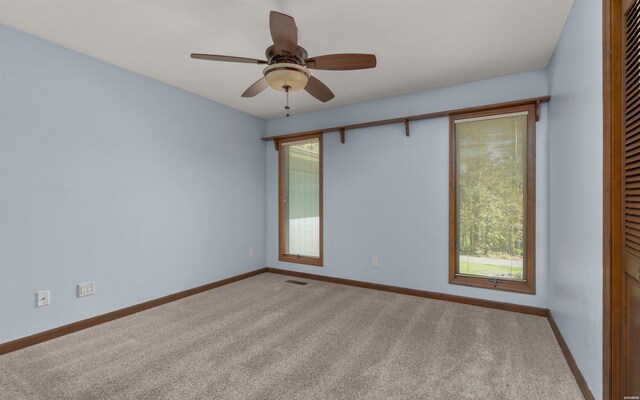 5 Arga Pl, Hot Springs, AR 71909 - spare room featuring plenty of natural light, carpet, and a ceiling fan