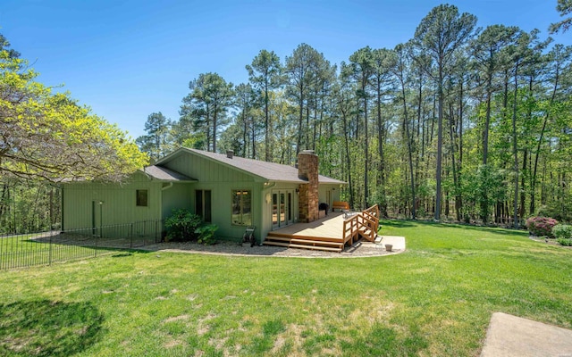 5 Arga Pl, Hot Springs, AR 71909 - rear view of property featuring a chimney, a deck, and board and batten siding