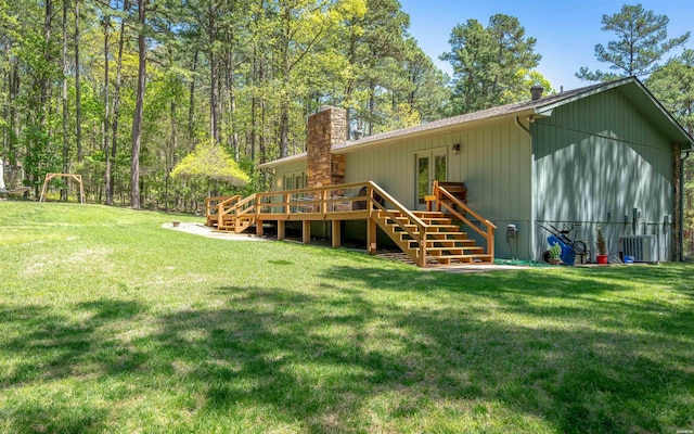 5 Arga Pl, Hot Springs, AR 71909 - back of property featuring french doors, a chimney, a wooden deck, and a yard