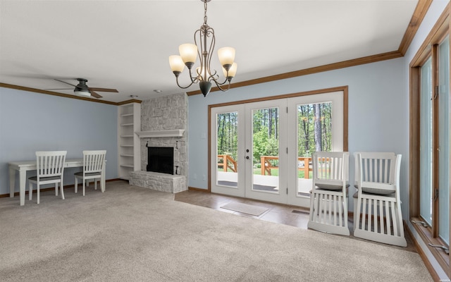 5 Arga Pl, Hot Springs, AR 71909 - living room featuring ornamental molding, carpet flooring, built in shelves, a ceiling fan, and french doors