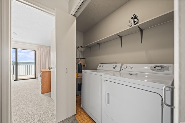5371 Central Ave Unit 6E, Hot Springs, AR 71913 - washroom with independent washer and dryer, water heater, a water view, and light carpet