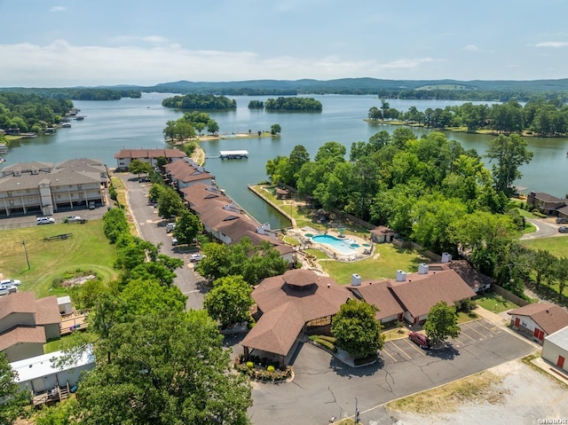 birds eye view of property featuring a water view and a residential view