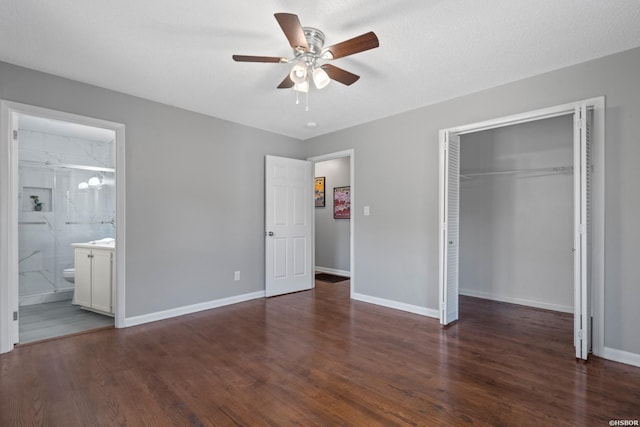235 Echo Pt, Hot Springs, AR 71913 - unfurnished bedroom featuring a closet, wood finished floors, connected bathroom, and ceiling fan