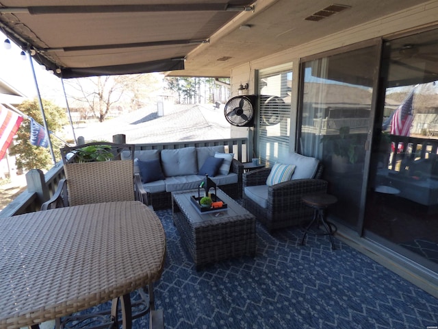 view of patio with an outdoor hangout area and visible vents