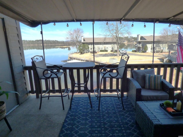 sunroom with a water view