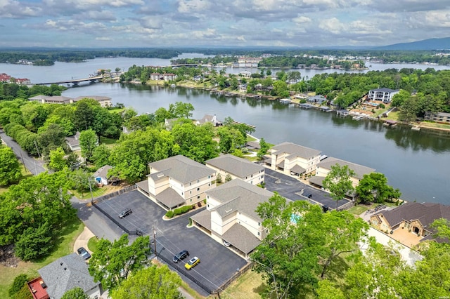 drone / aerial view with a residential view and a water view