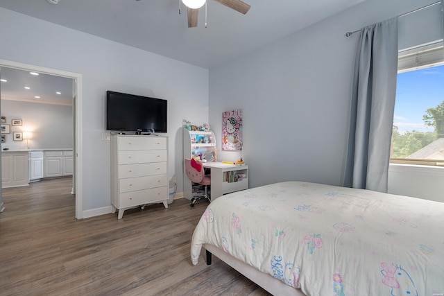 bedroom with baseboards, ceiling fan, recessed lighting, and wood finished floors