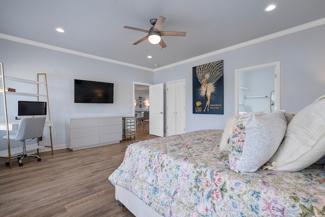 bedroom featuring ornamental molding, recessed lighting, and wood finished floors