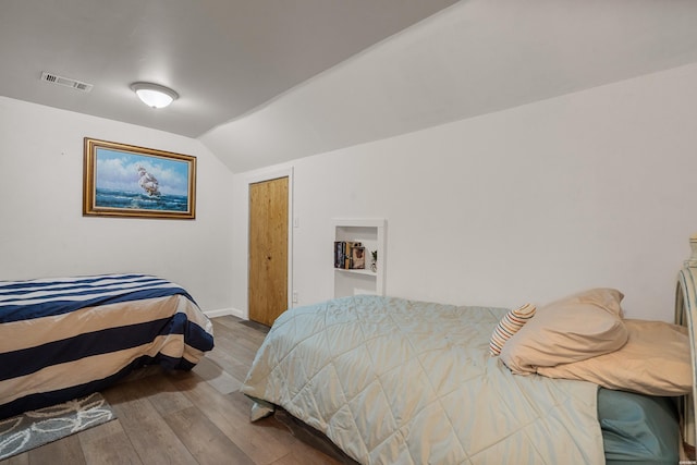181 Fish Hatchery Rd Unit P2, Hot Springs, AR 71913 - bedroom with vaulted ceiling and wood finished floors
