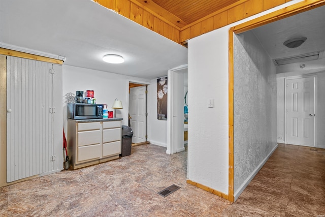 598 Timberlake Dr, Royal, AR 71968 - interior space featuring stainless steel microwave, visible vents, and baseboards