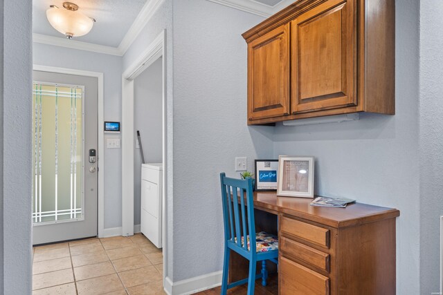 office space with washer / dryer, baseboards, crown molding, and light tile patterned flooring