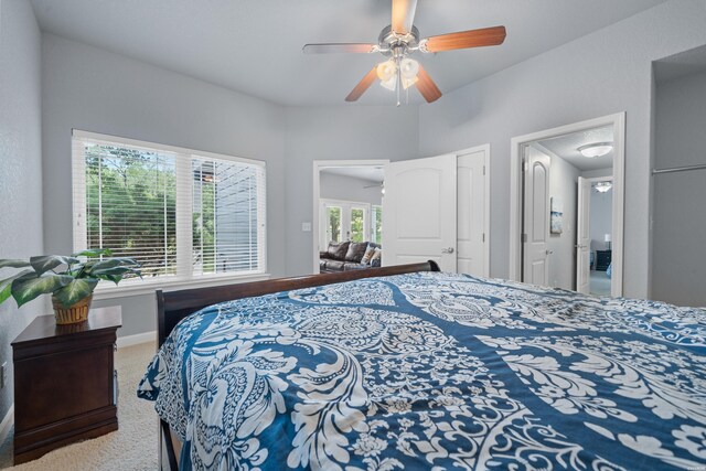 bedroom with carpet flooring, ceiling fan, and baseboards